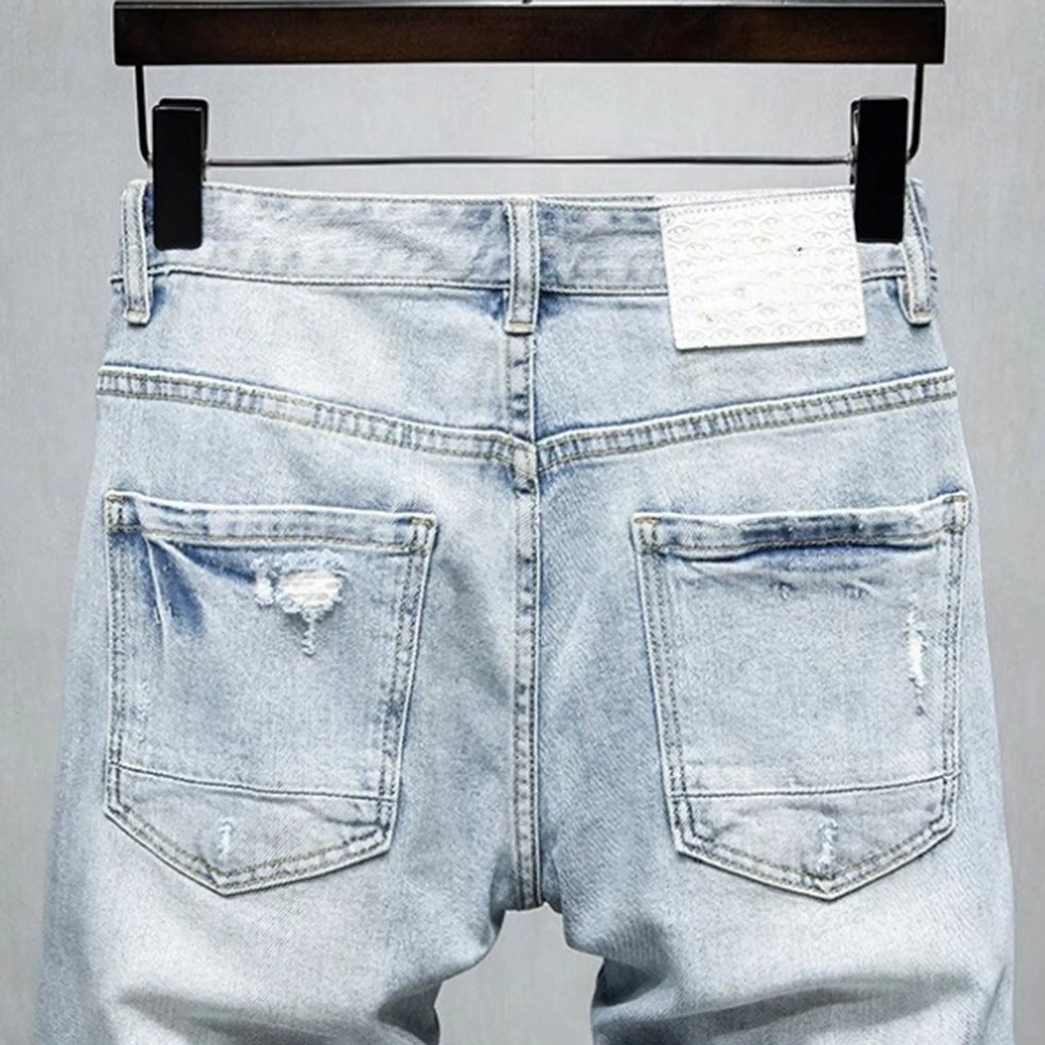 Distress-washed Light blue denim shorts for men